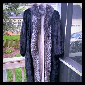 Full length mink with a fox collar.